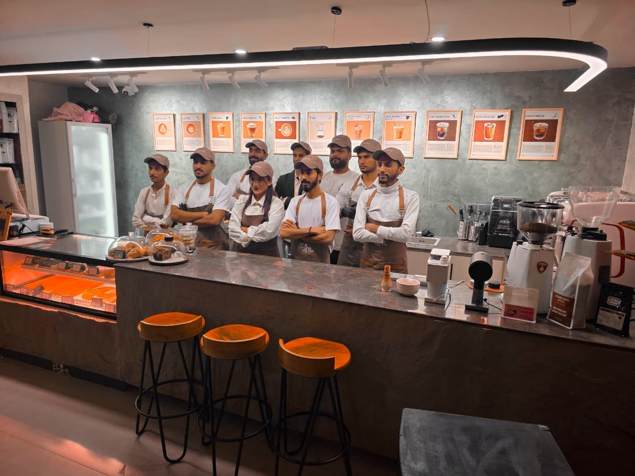 Barista preparing coffee at The Point Café